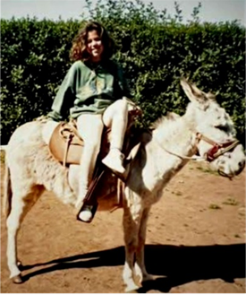 Elena montando una yegua